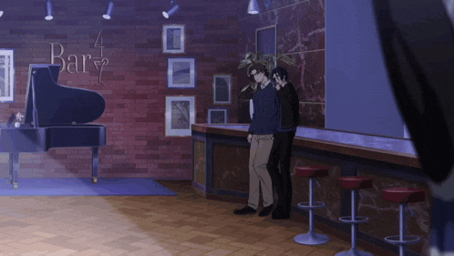 two men standing in front of a piano in a room that says bar