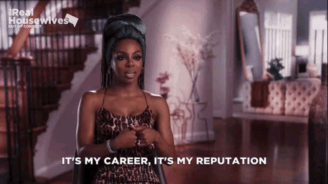 a woman says it 's my career it 's my reputation in front of a staircase