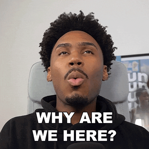 a man making a funny face with the words why are we here