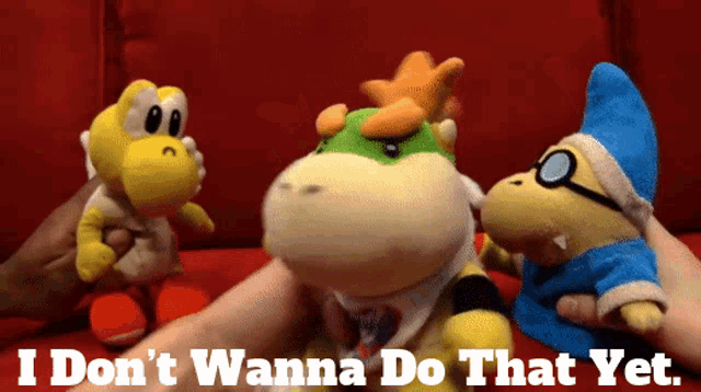 a stuffed animal with the words " i don t wanna do that yet " on it