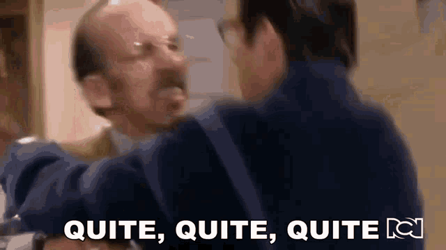 two men are having a fight and one of them is yelling at the other .
