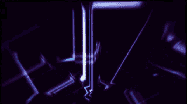 a dark room with a blue light coming out of the corner