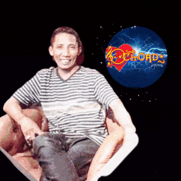 a man in a striped shirt is sitting in front of a chords music logo