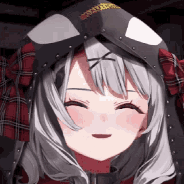 a close up of a girl wearing a mask and a plaid shirt making a funny face .