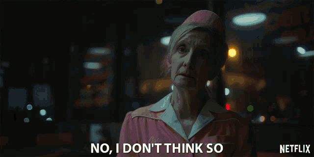 an older woman in a pink uniform says no i don 't think so