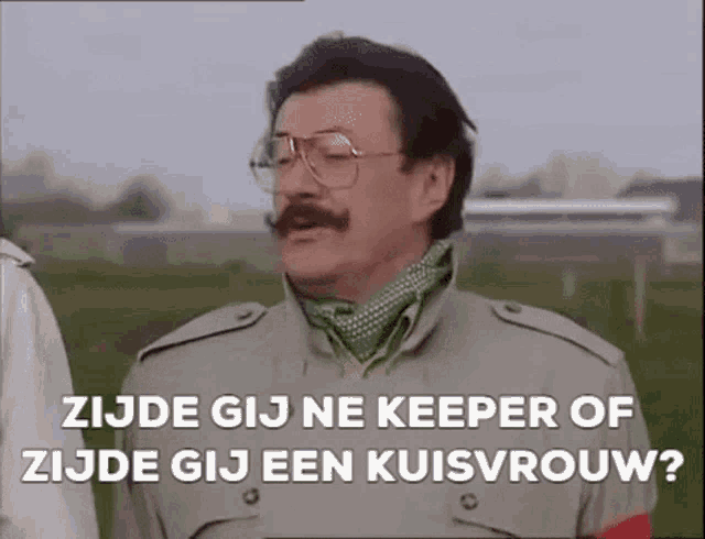 a man with glasses and a mustache is wearing a trench coat and scarf .