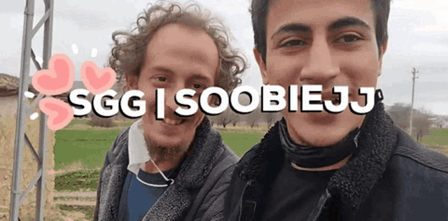 two men are standing next to each other with the words sgg i soobiejj written above them