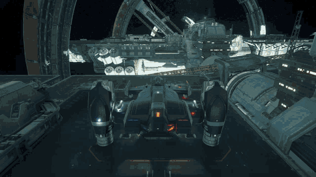 a space ship is sitting on a dock in a large space station