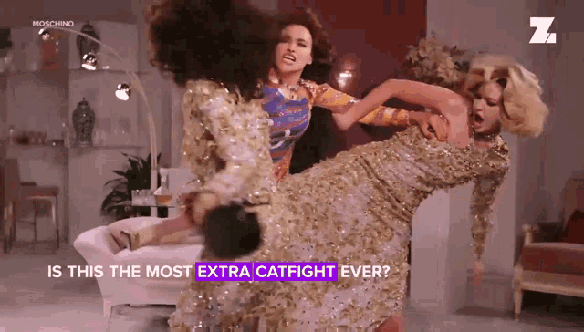 a moschino ad shows three women fighting with the caption is this the most extra catfight ever