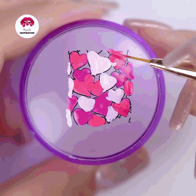 a purple circle with pink and white hearts painted on it with the words rude inspiration on the bottom