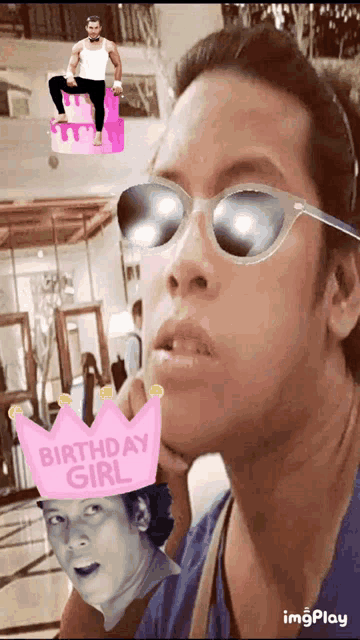 a man wearing sunglasses and a pink birthday girl hat