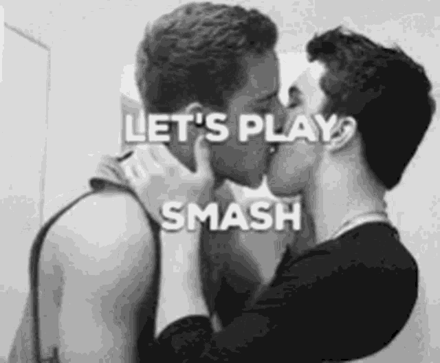 a black and white photo of two men kissing with the words `` let 's play smash '' above them .