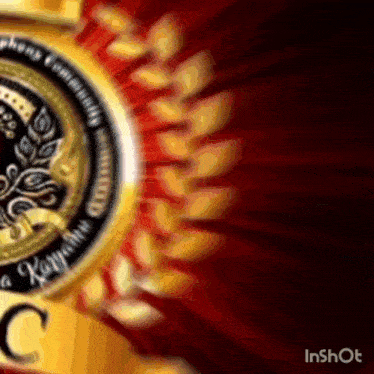 a gold medal on a red background with the letter c on the bottom