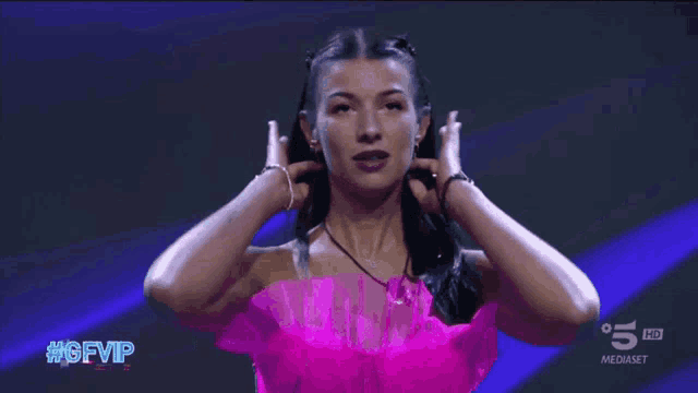 a woman in a pink dress with the hashtag #gfvip on it
