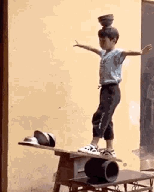 Balancing Act Acrobat GIF - Balancing Act Acrobat Trick GIFs