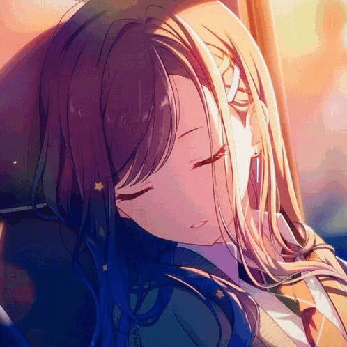 a girl with long hair and a star in her hair is sleeping