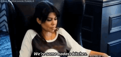a woman is sitting in a chair and says `` we 're some badass bitches '' .
