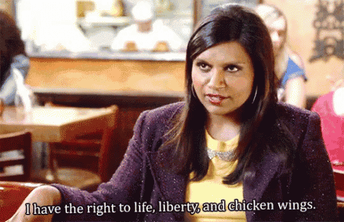 a woman in a purple jacket says i have the right to life liberty and chicken wings .