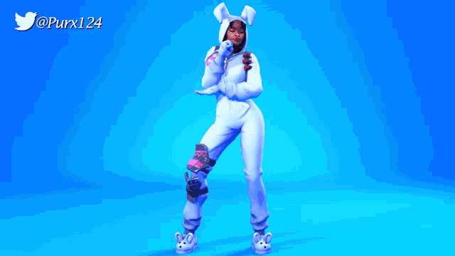 a woman in a white bunny costume is standing in front of a blue background