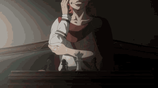 a man is sitting at a table with a chess piece on it