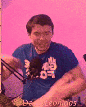 a man wearing a blue shirt with the word leonidas on the bottom