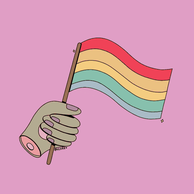 a hand with purple nails is holding a rainbow flag with a star on top