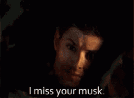 a close up of a man 's face with the words i miss your musk