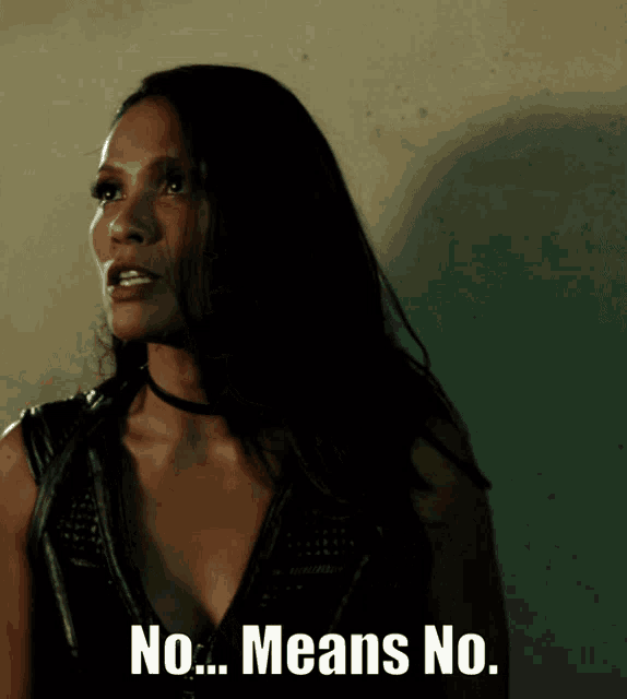 a woman says " no means no " in front of her face