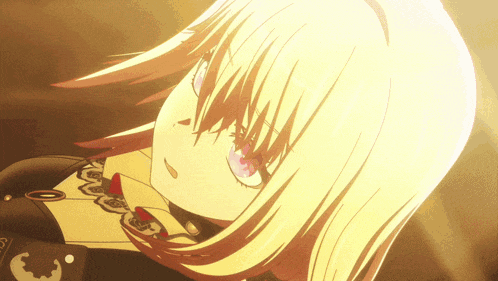 a close up of a girl 's face with a necklace that says s on it
