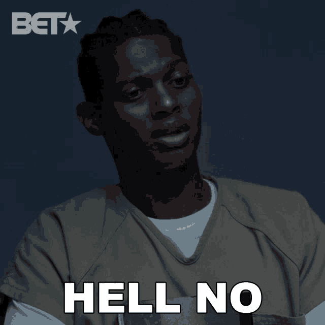 a man in a prison uniform says " hell no "