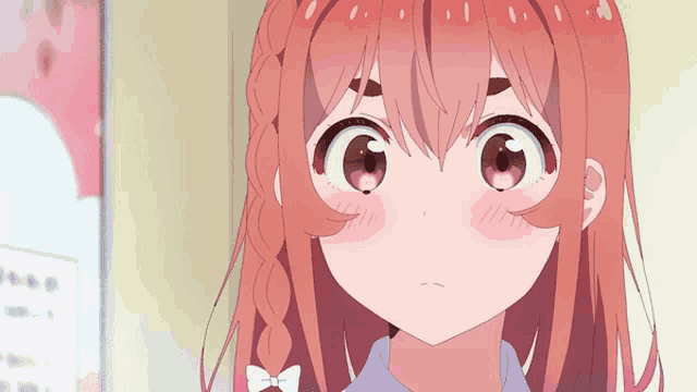 a close up of a girl with pink hair