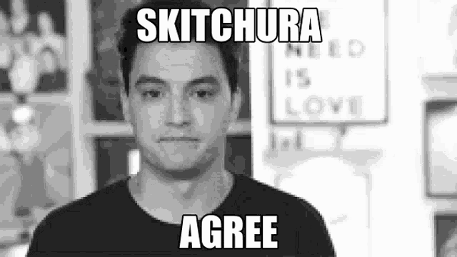 a man is making a funny face in a black and white photo with a meme .
