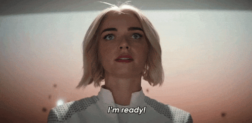 a close up of a woman 's face with the words `` i 'm ready '' written on it .