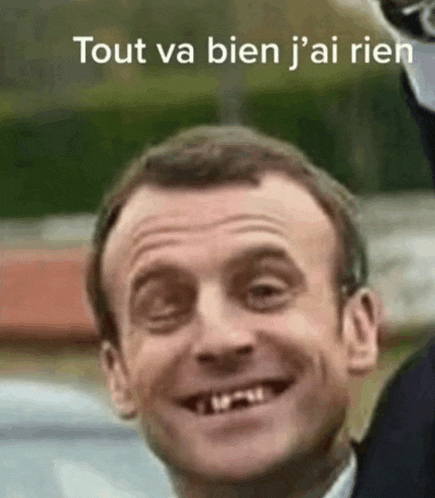 a close up of a man 's face with the words tout va bien j 'ai rien written above him .