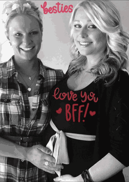 two women are standing next to each other and one of them is wearing a shirt that says love you bff