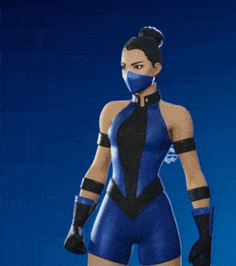 a woman in a blue and black outfit with a mask on