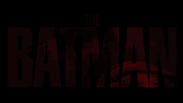 a dark background with the word batman in red