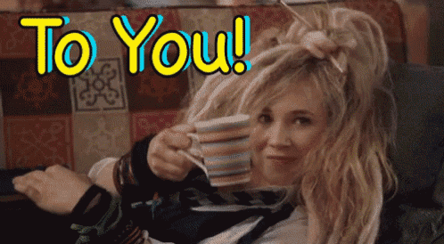 a woman is sitting on a couch with a cup of coffee and the words to you are above her