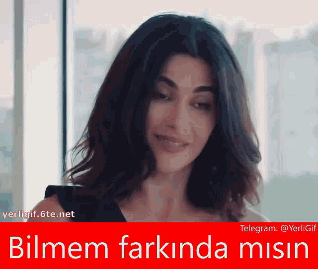 a picture of a woman with the words bilmem farkinda misin below her