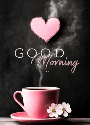 a cup of coffee with a pink heart above it and the words good morning