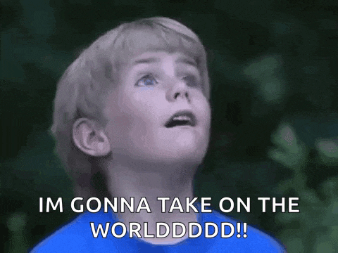 a young boy in a blue shirt says im gonna take on the worldddd