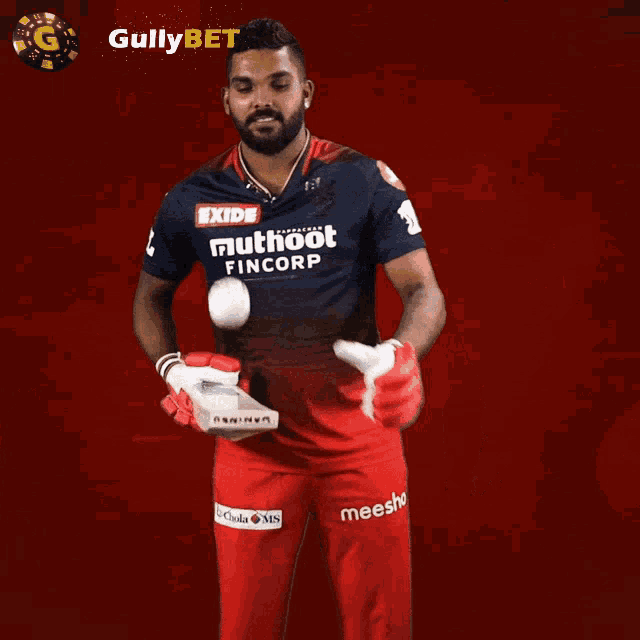 a man holding a cricket bat in front of a gullybet banner