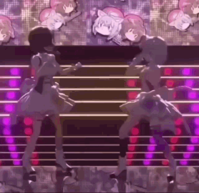 two anime girls are dancing together on a stage .