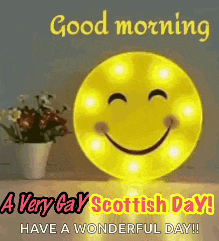 a very gay scottish day greeting card with a smiley face