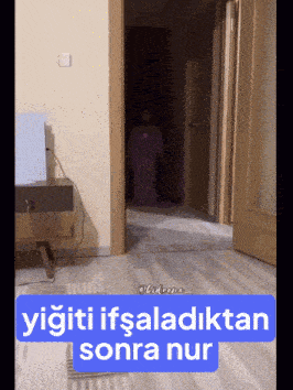 a video of a person walking through a hallway with a caption that says yiğiti ifsaladaktan sonra nur