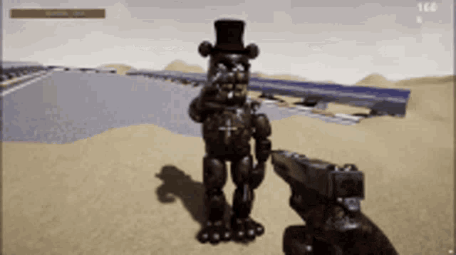 a person is holding a gun in front of a teddy bear in a top hat