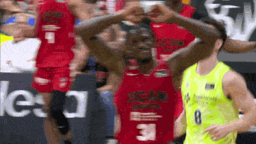 a basketball player wearing a red jersey with the number 31