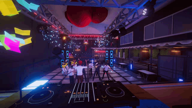 people are dancing in a club with a dj booth that says pioneer