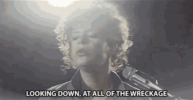 Looking Down At All The Wreckage Arcade Fire GIF - Looking Down At All The Wreckage Arcade Fire Looking Down GIFs
