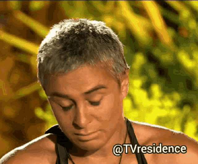 a close up of a woman 's face with the words @tvresidence on the bottom